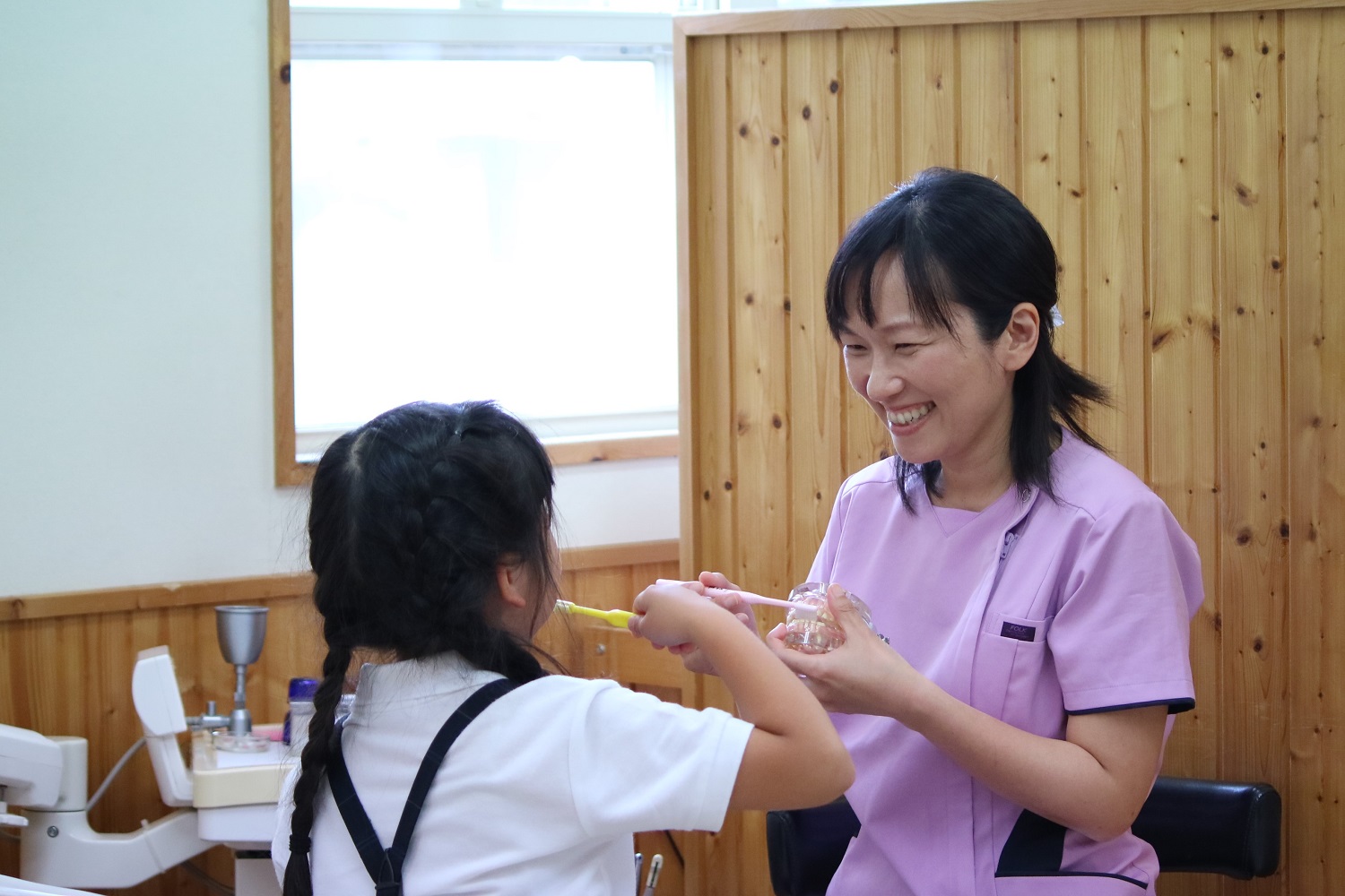 女性の先生による診察